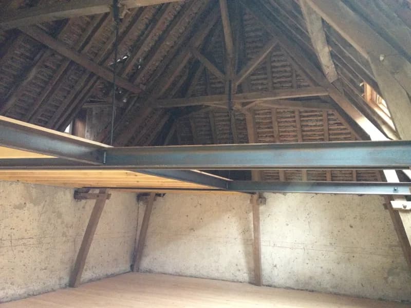 Reprise de charge par profilés métalliques sous une charpente ancienne